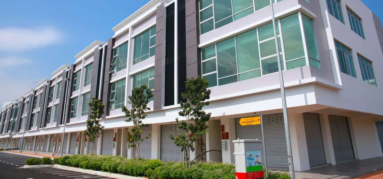 Shop-office blocks with street trees and hedges at CI Medini ION